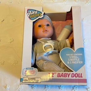NIB Play right Baby Bella Doll 12 inches Play set.